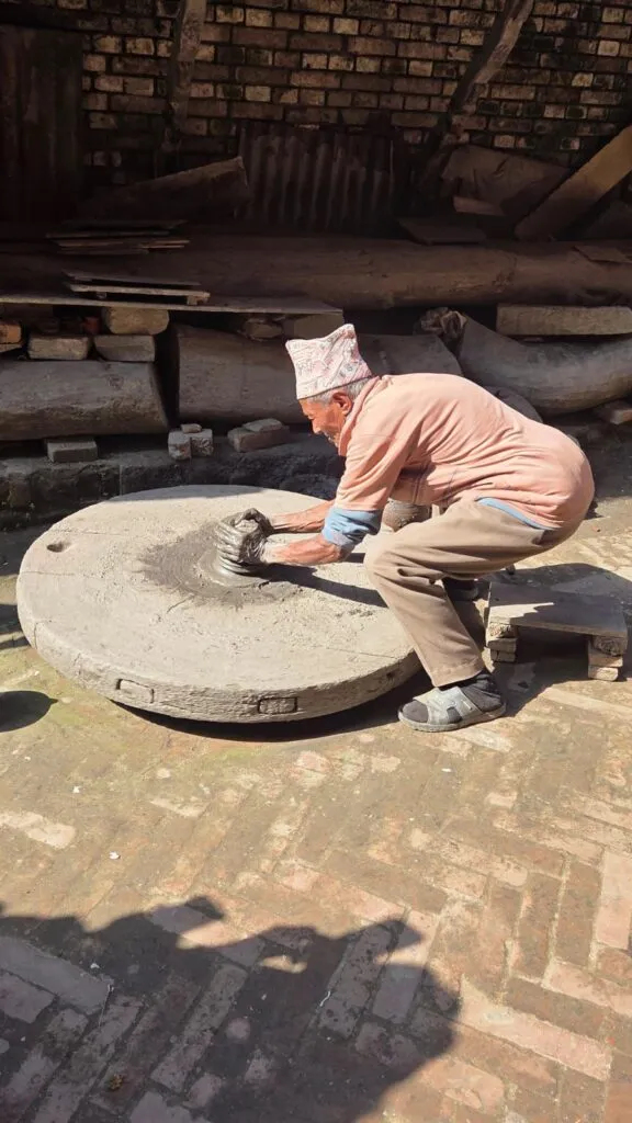 A man is making clay in the village. A organic and cultural form of Nepal